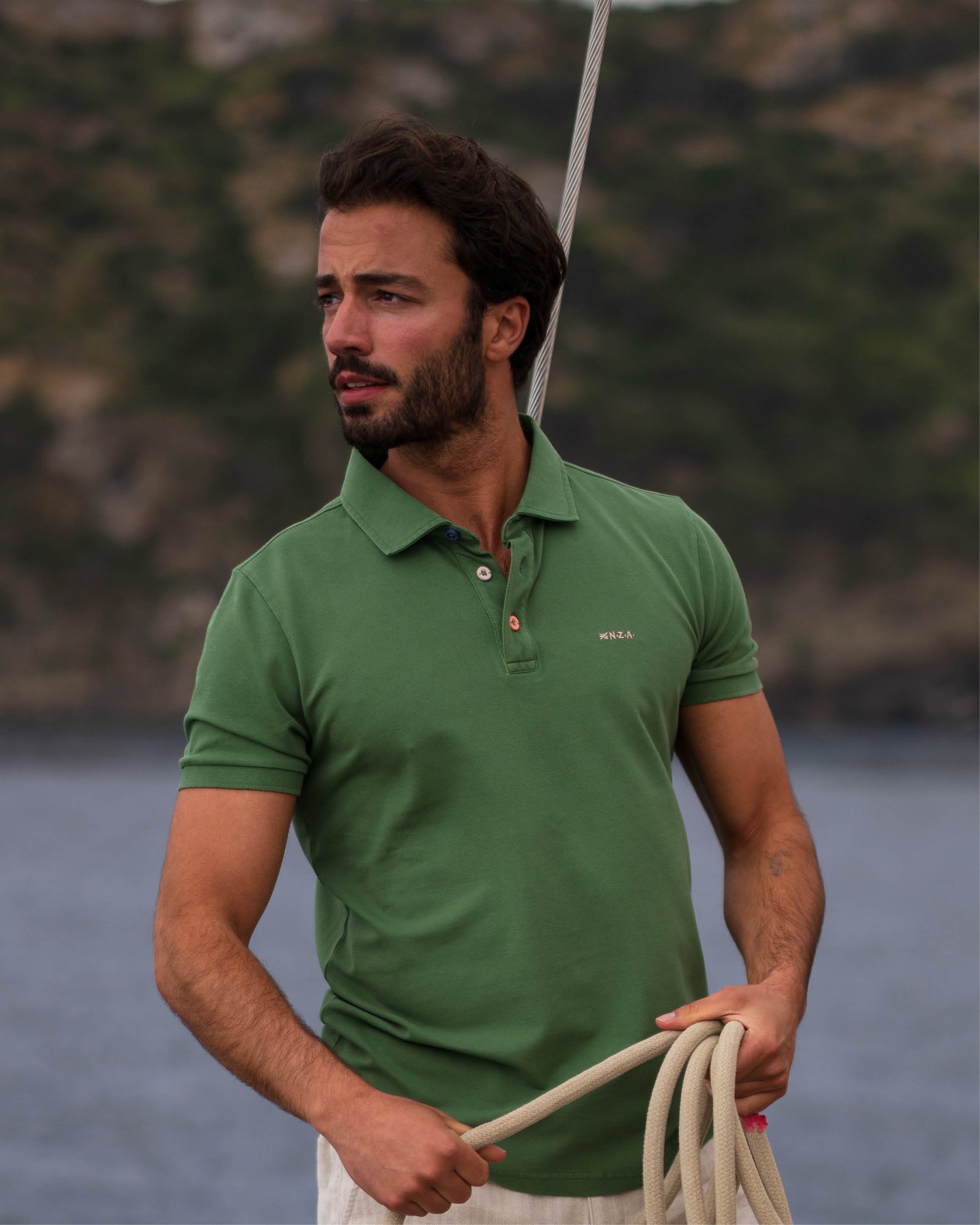 Dunkelgrünes Baumwoll-Stretch-Poloshirt Dunkelgrünes Baumwoll-Stretch-Poloshirt