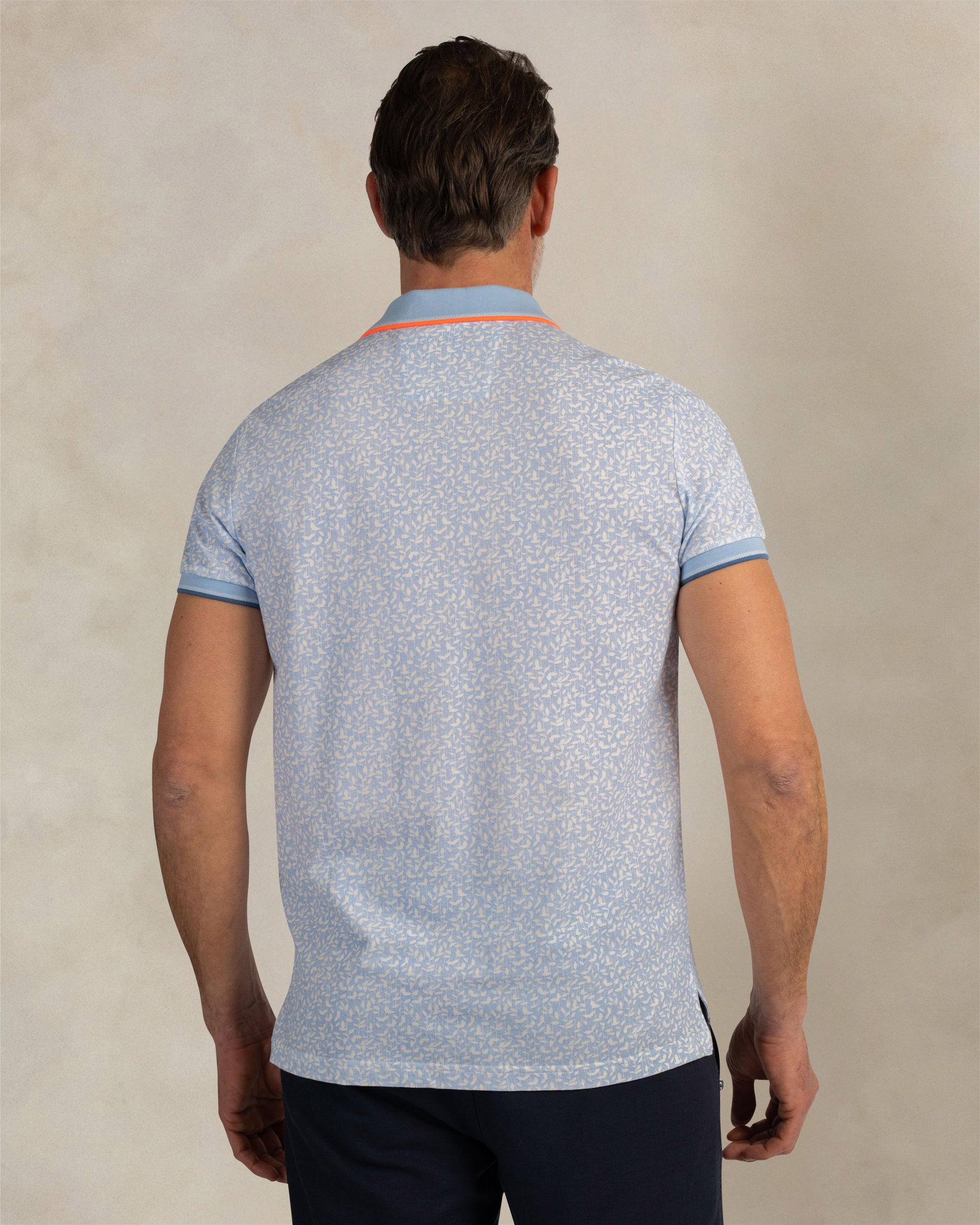 Polo imprimé en 100% coton bleu clair Polo imprimé en 100% coton bleu clair