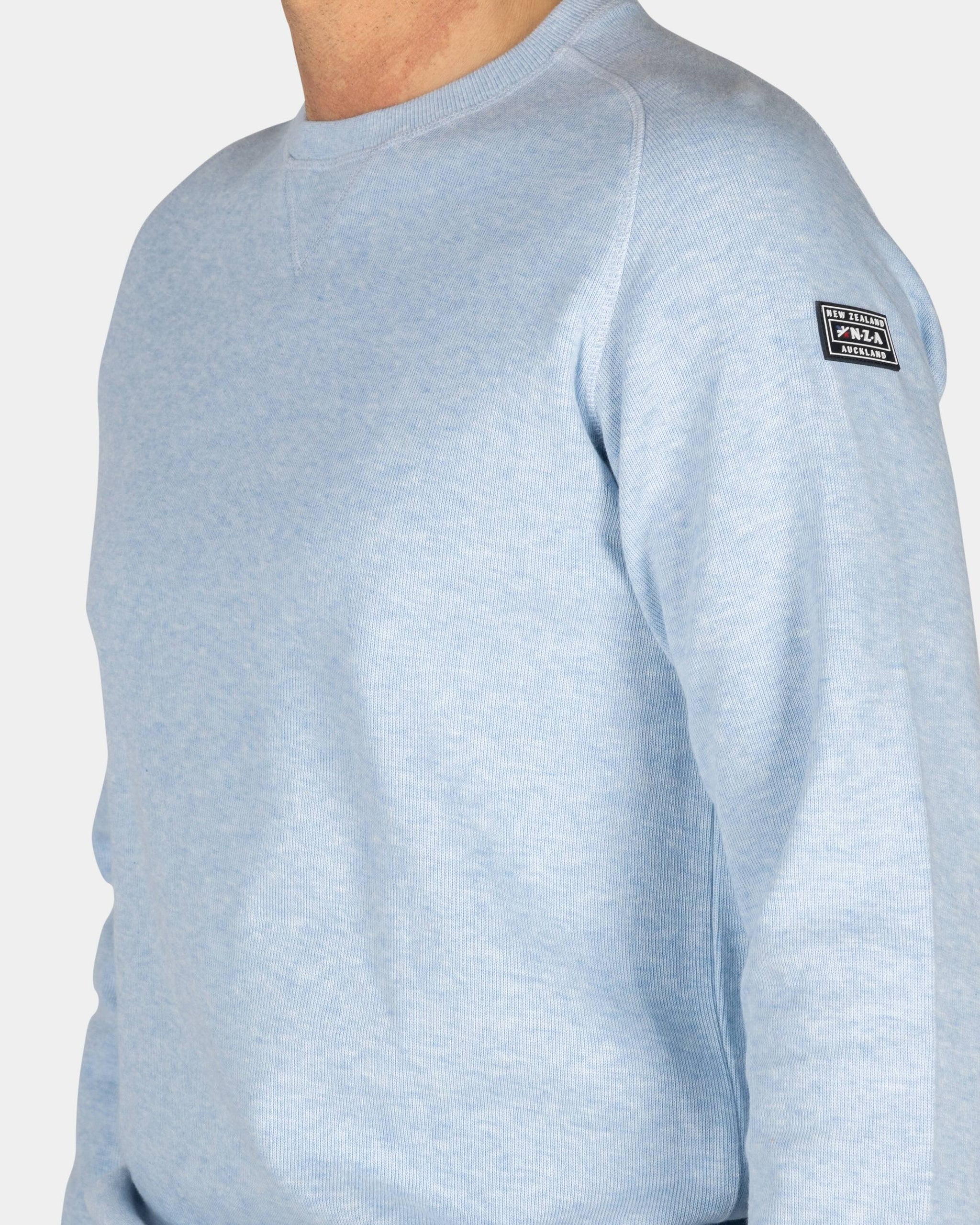 Light blue pullover with round neck Light blue pullover with round neck