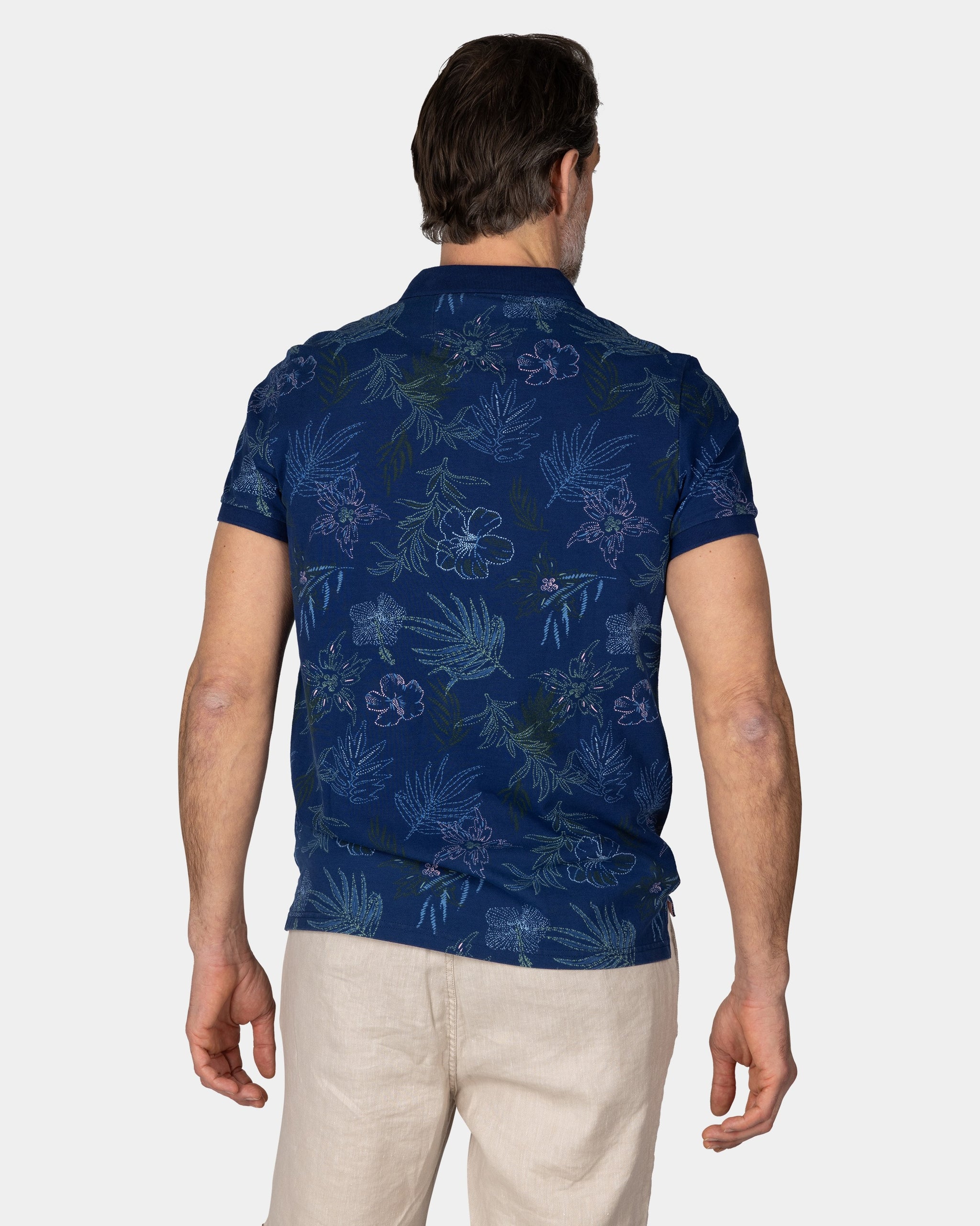 Baumwollnavy Polo mit Blattprint Baumwollnavy Polo mit Blattprint