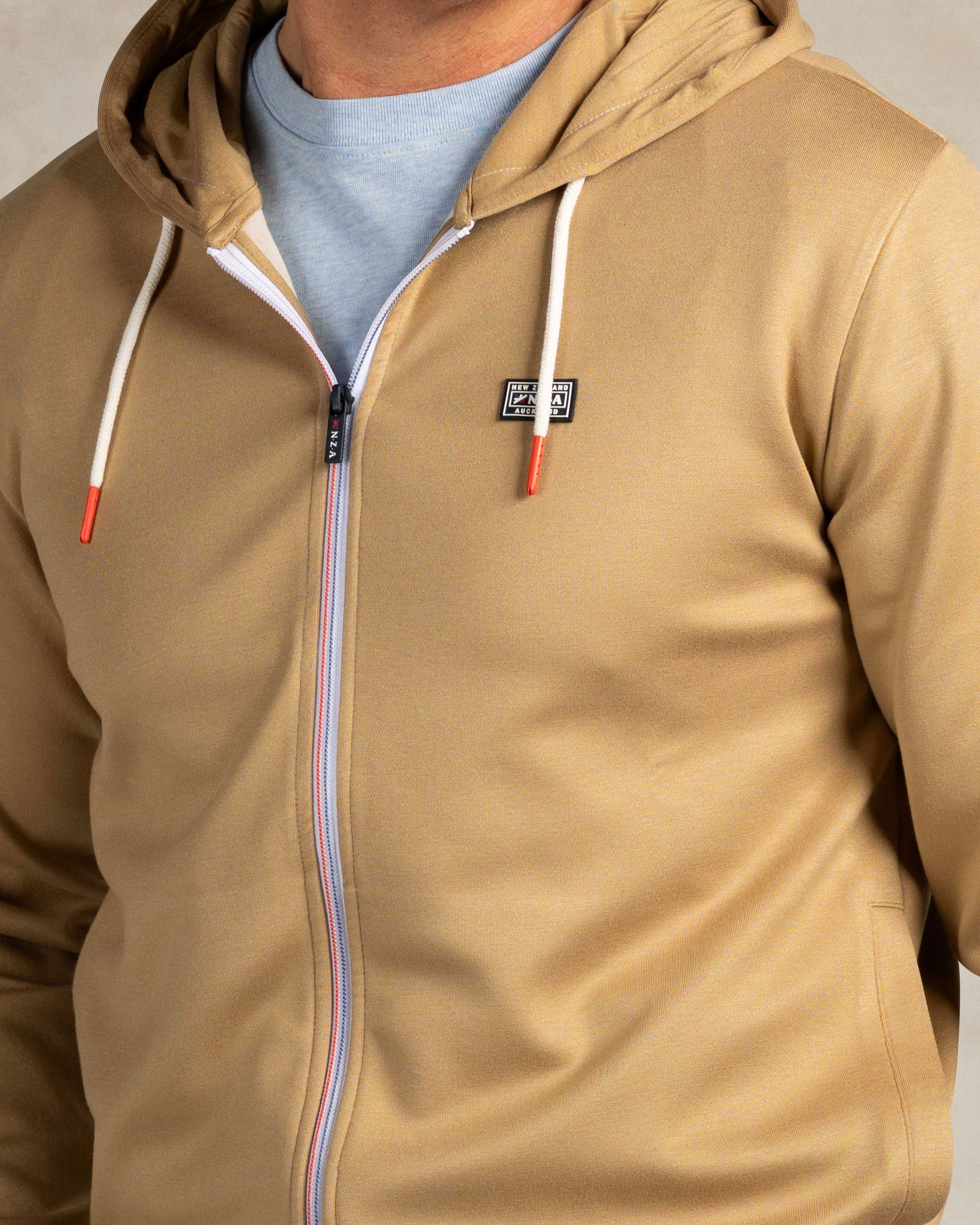 Ecru vest met capuchon Ecru vest met capuchon