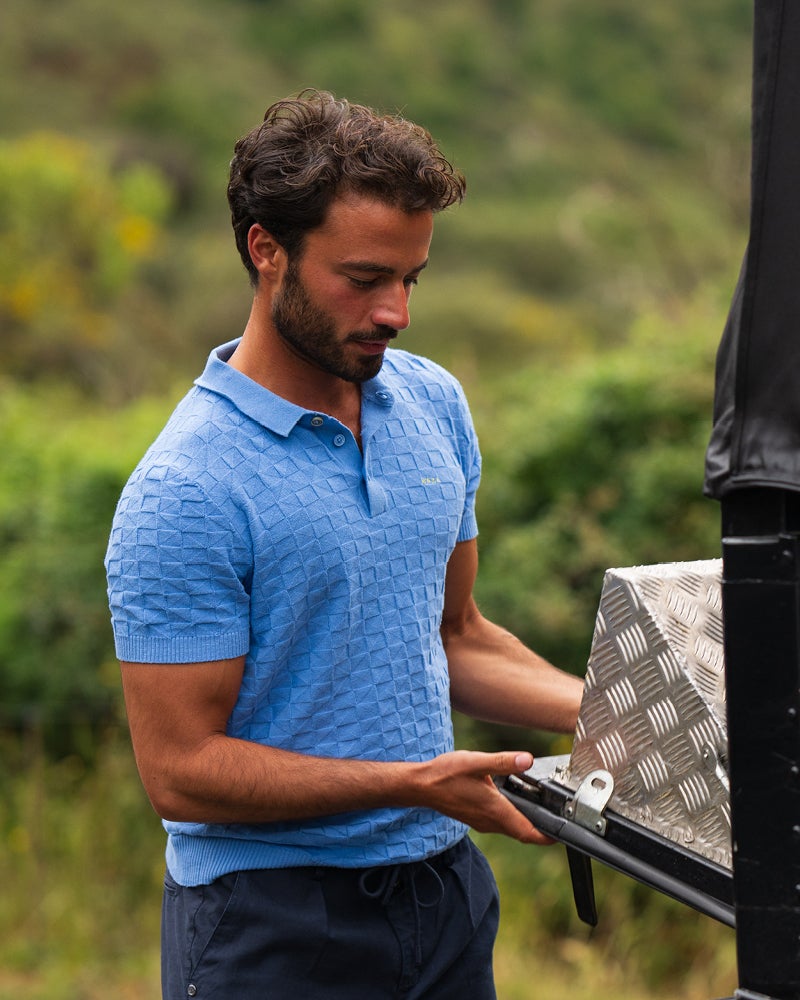 Blauwe structuur polo Blauwe structuur polo