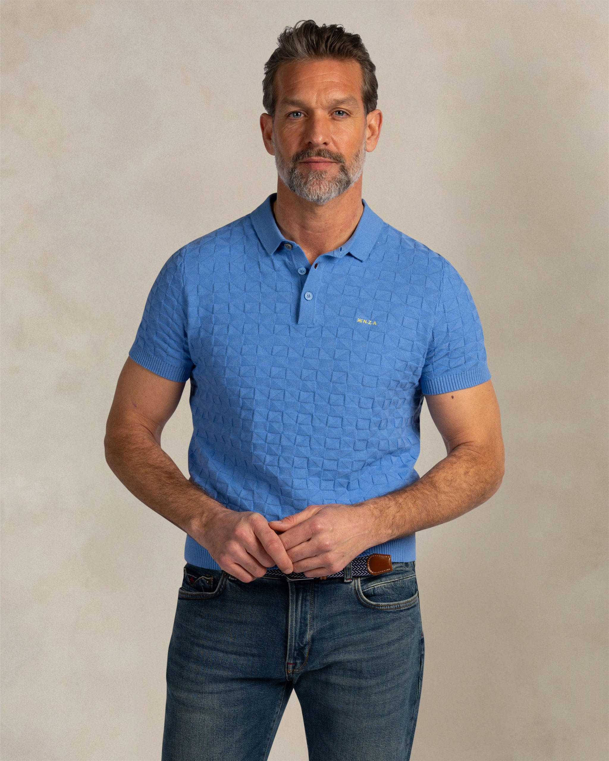 Blauwe structuur polo Blauwe structuur polo