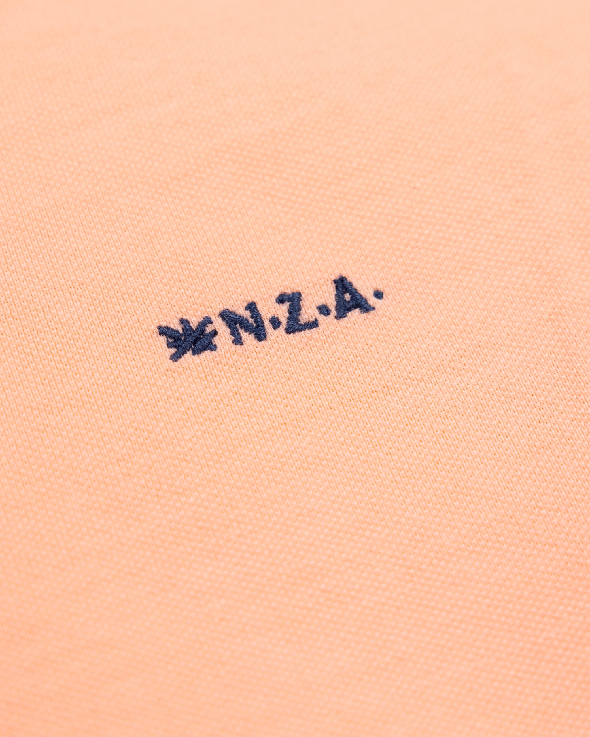 Polo uni en coton orange clair Polo uni en coton orange clair