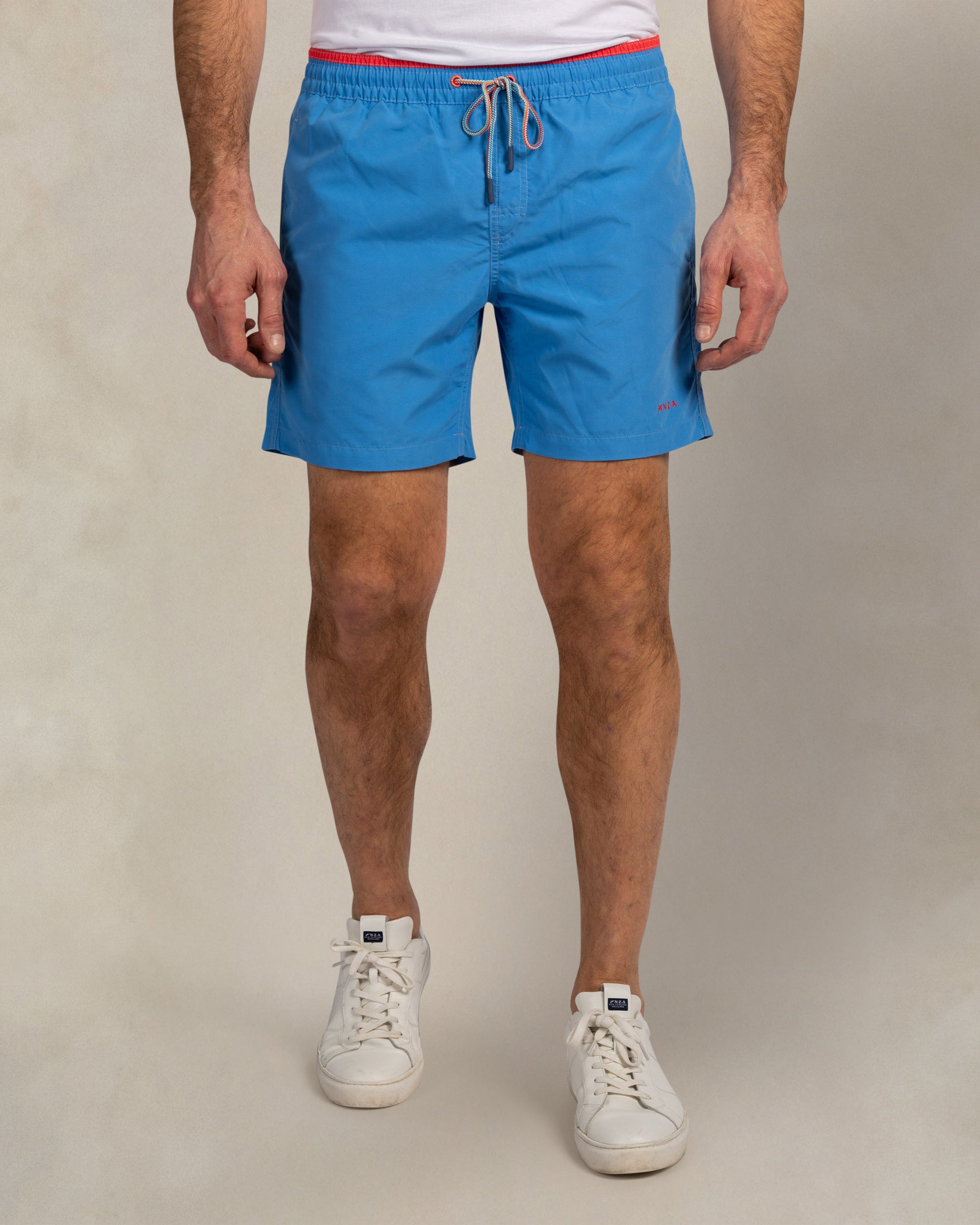 Short de bain bleu avec slip intérieur extensible Short de bain bleu avec slip intérieur extensible