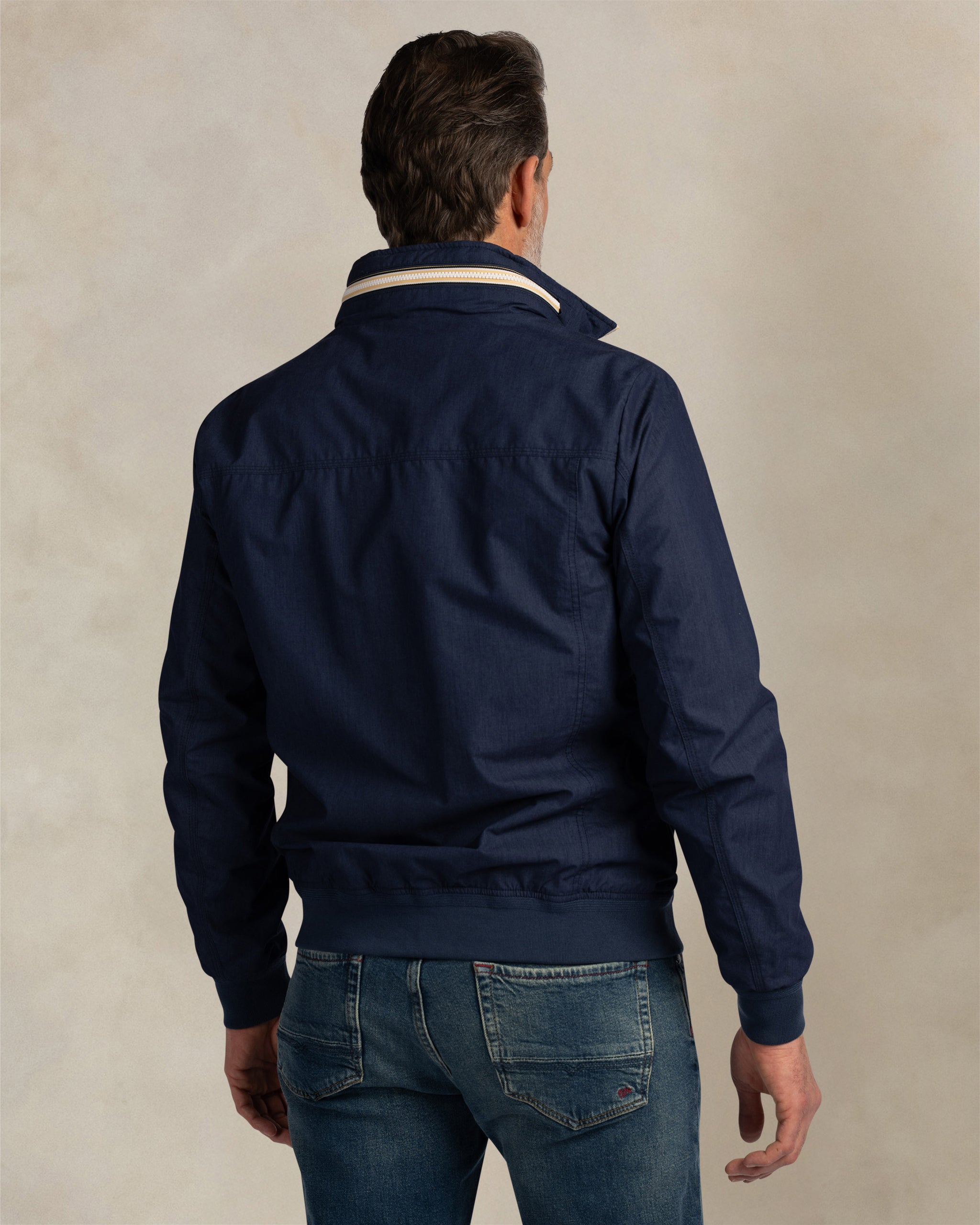 Donkerblauwe katoenen jas met rits Donkerblauwe katoenen jas met rits