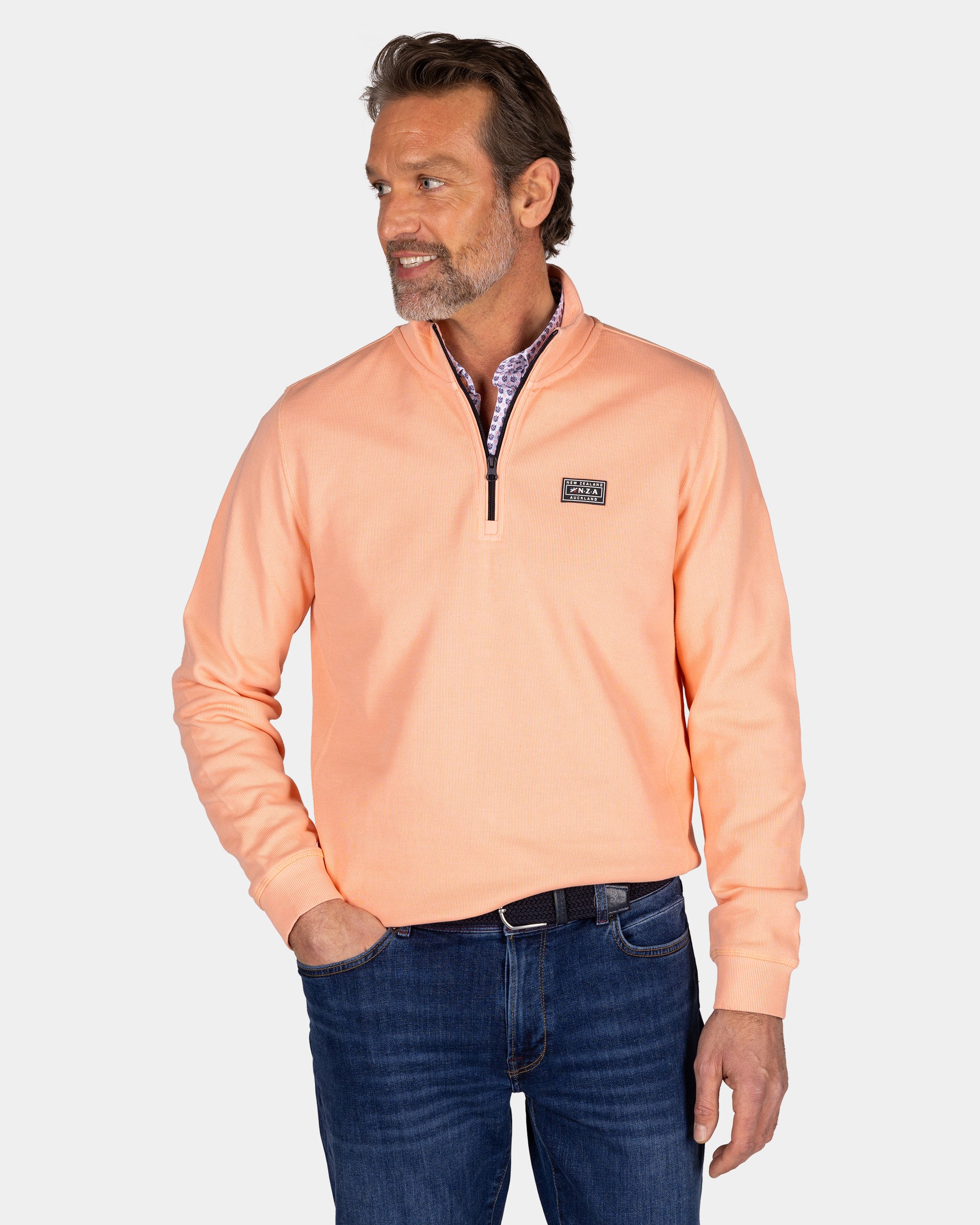 Perzikkleurige sweater met halve rits Perzikkleurige sweater met halve rits