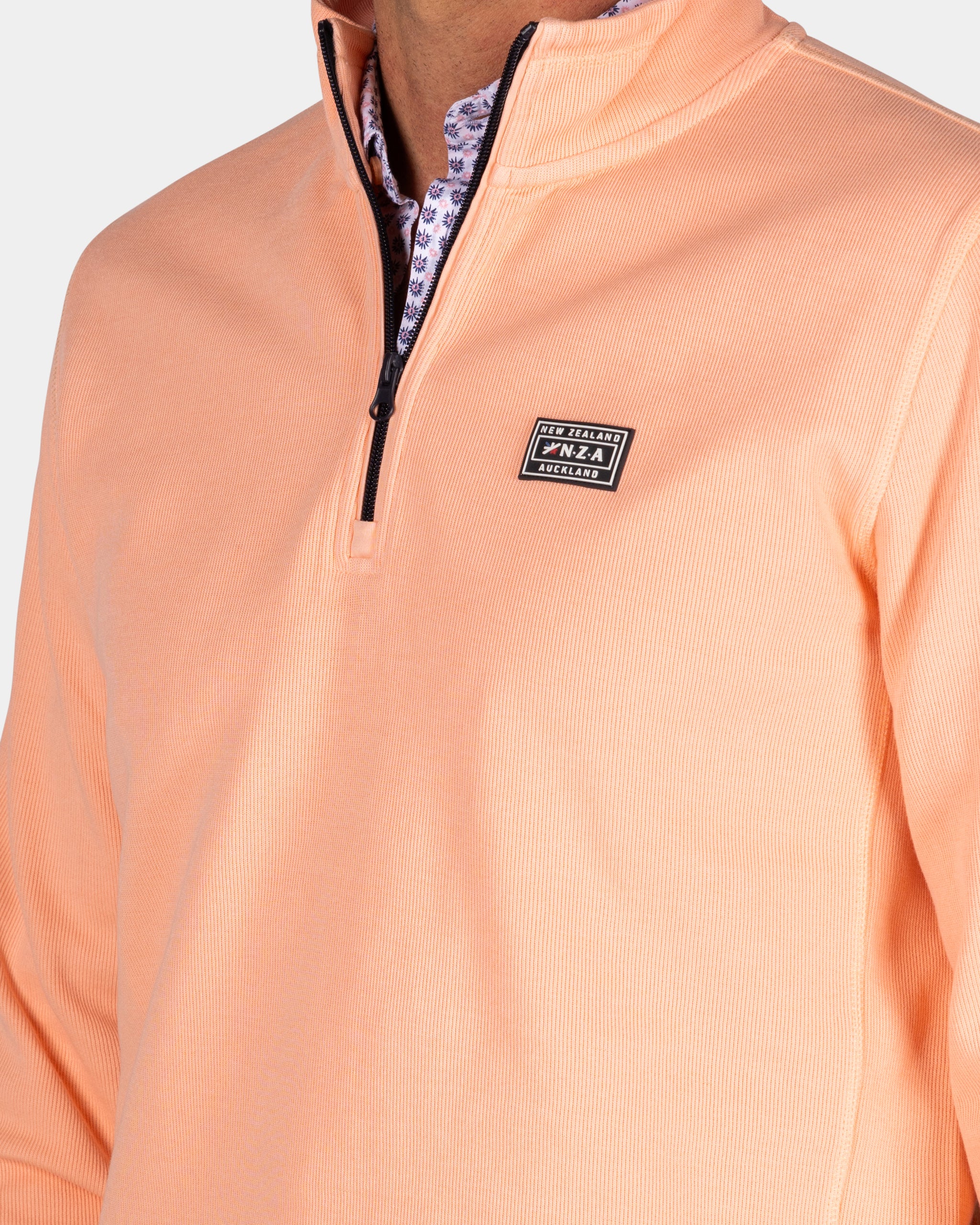 Perzikkleurige sweater met halve rits Perzikkleurige sweater met halve rits