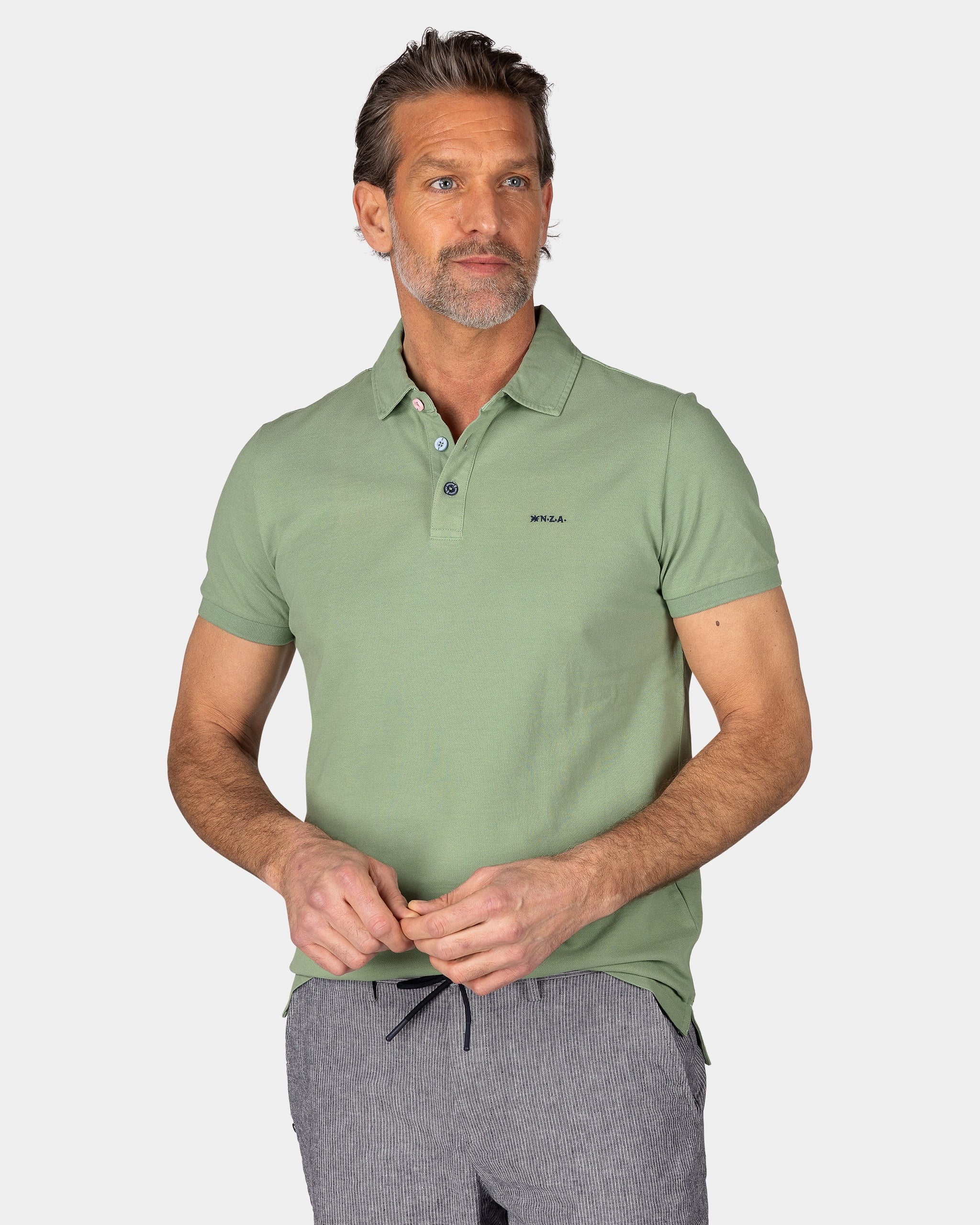 Einfarbige Baumwoll-Hellgrüne Polo Einfarbige Baumwoll-Hellgrüne Polo
