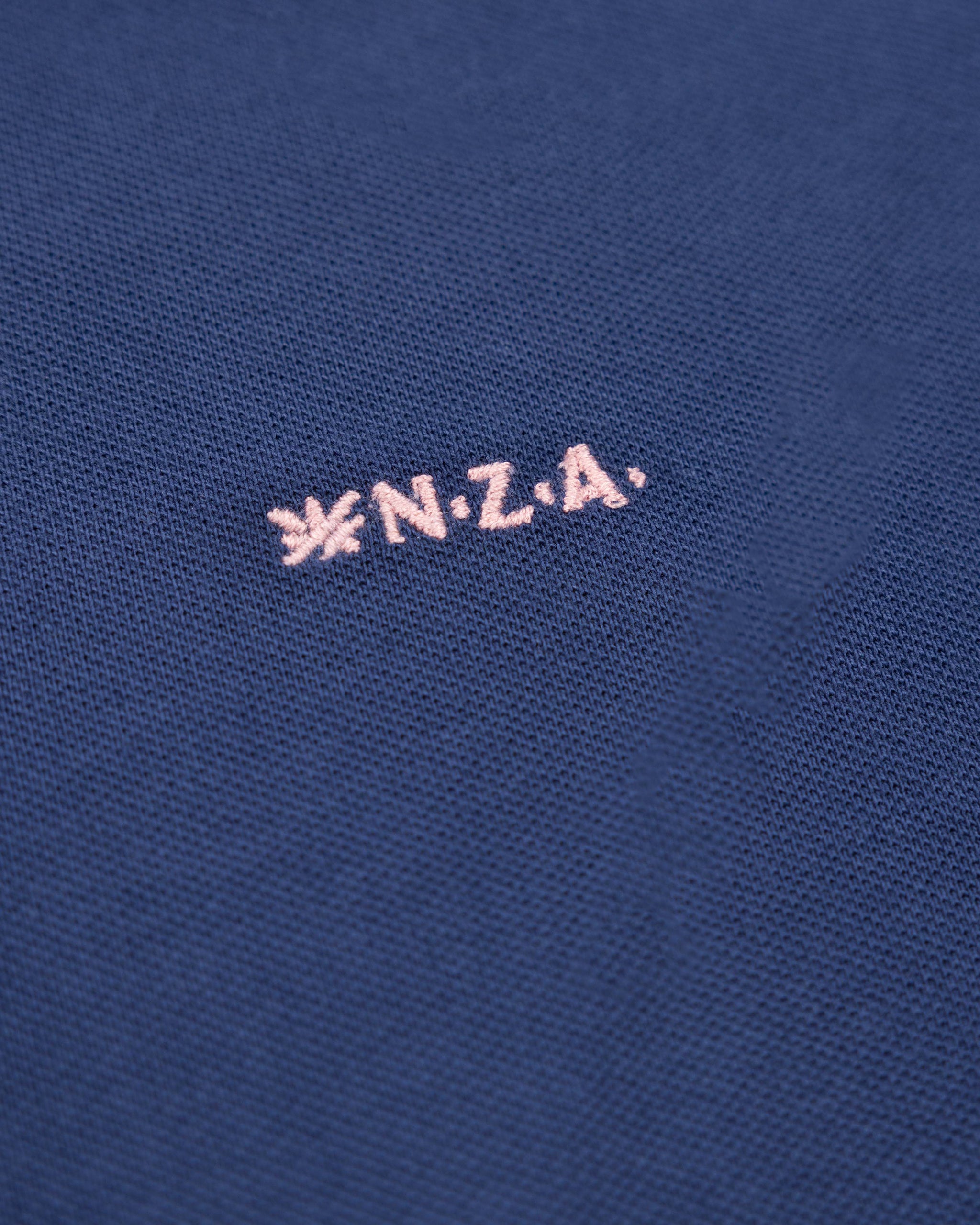 Polo liso de algodón azul Polo liso de algodón azul