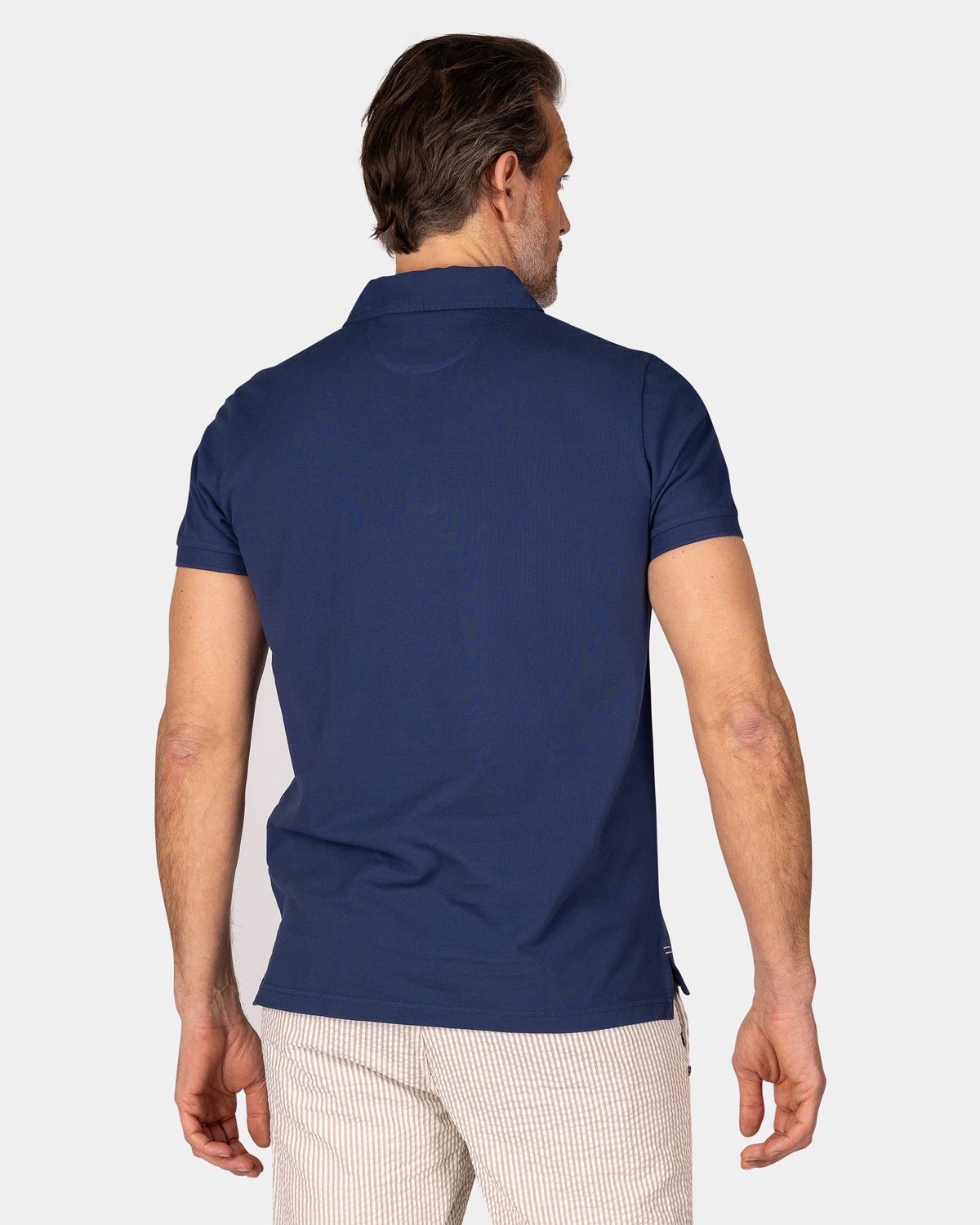 Polo uni en coton bleu Polo uni en coton bleu