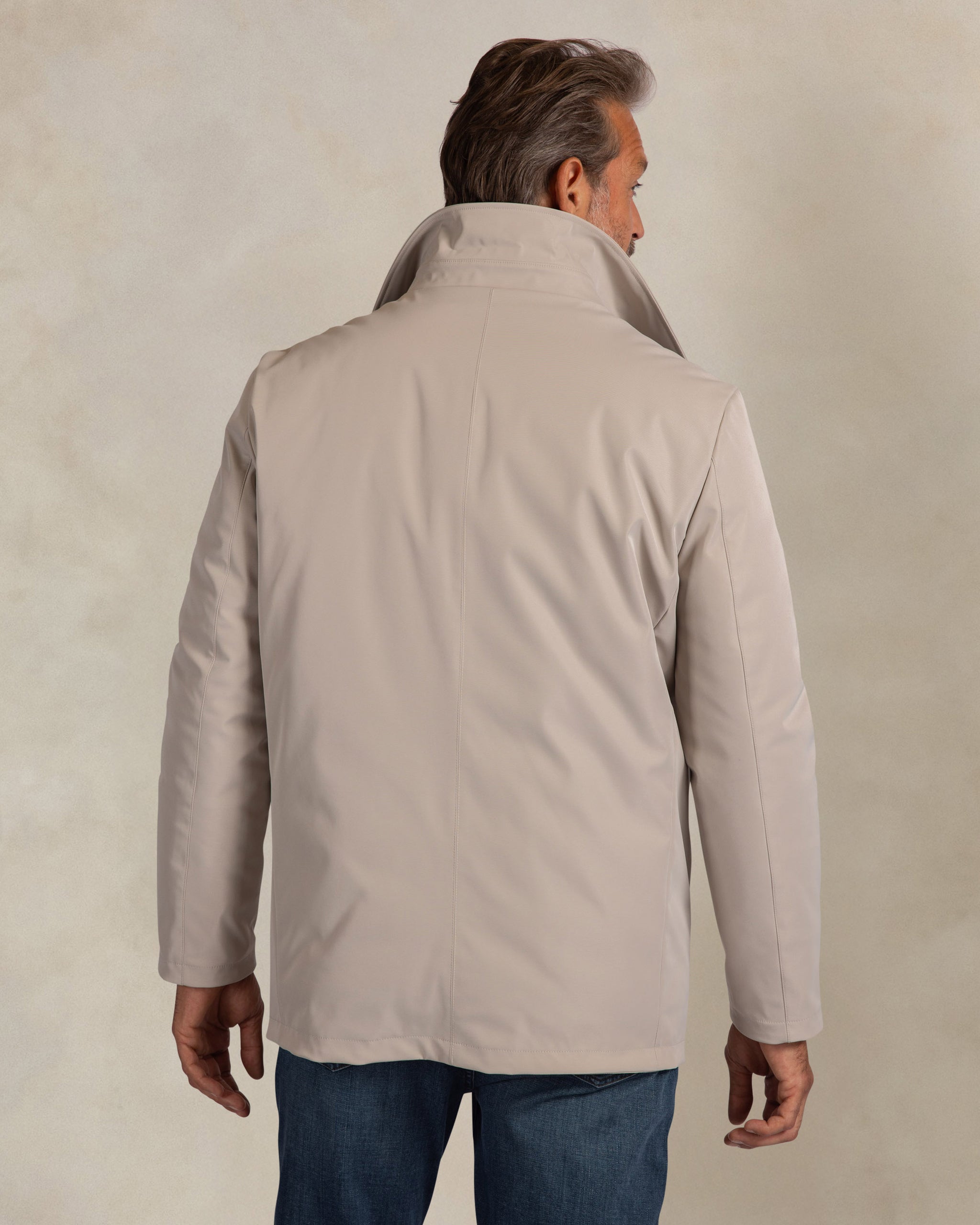 Ecru quilted coat with double closure Ecru quilted coat with double closure