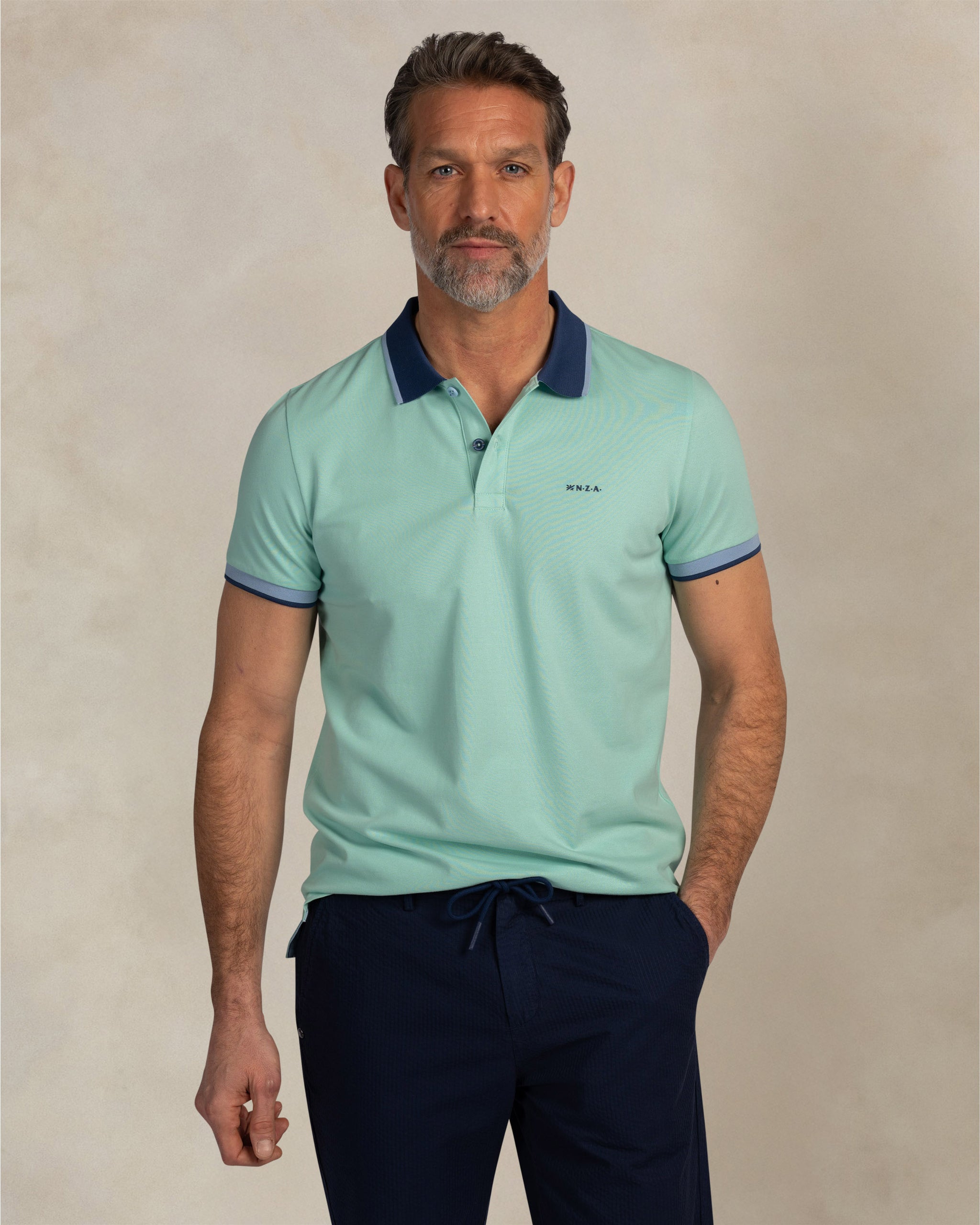 Grünes Baumwoll-Stretch-Poloshirt Grünes Baumwoll-Stretch-Poloshirt
