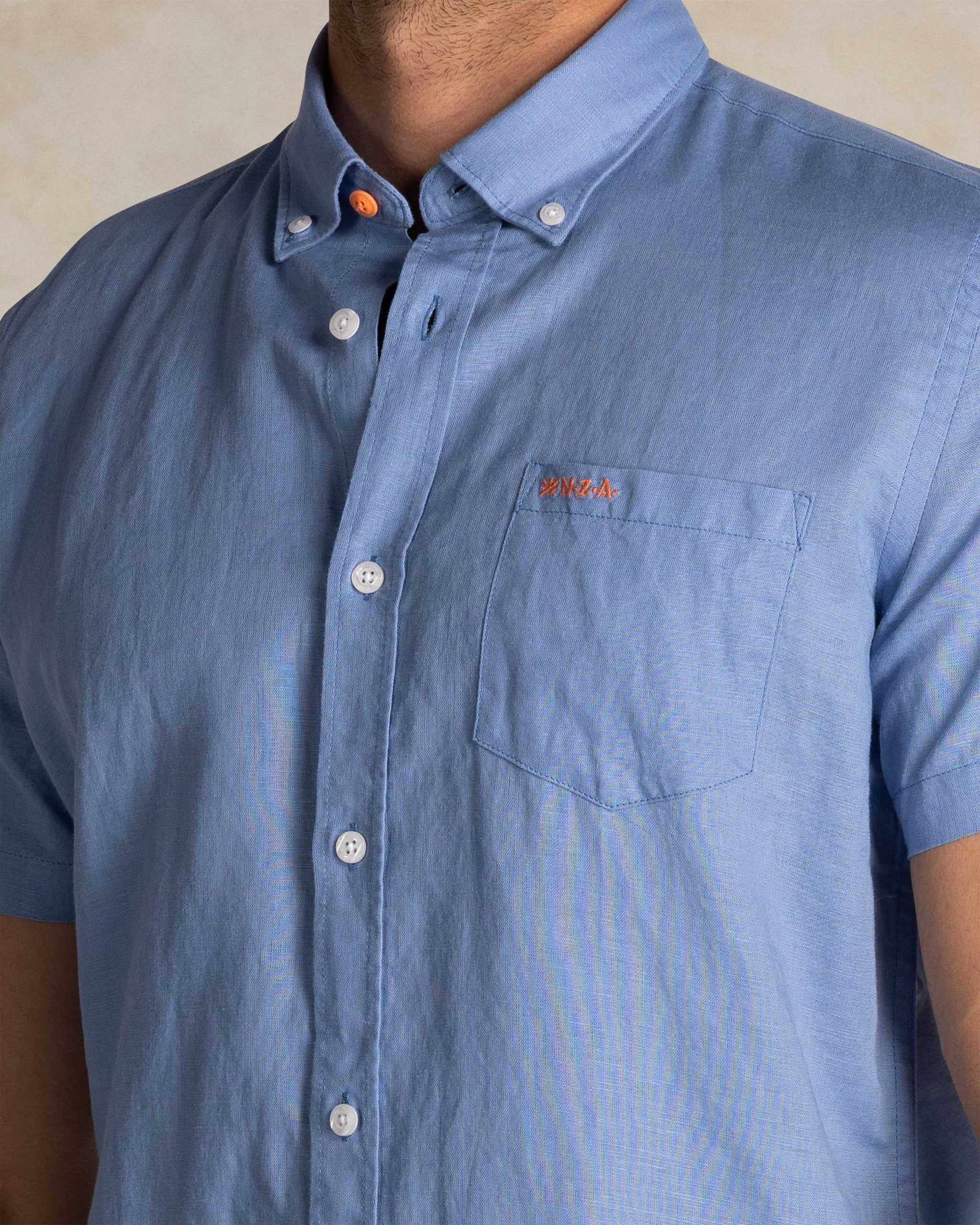 Camisa de lino azul de manga corta Camisa de lino azul de manga corta