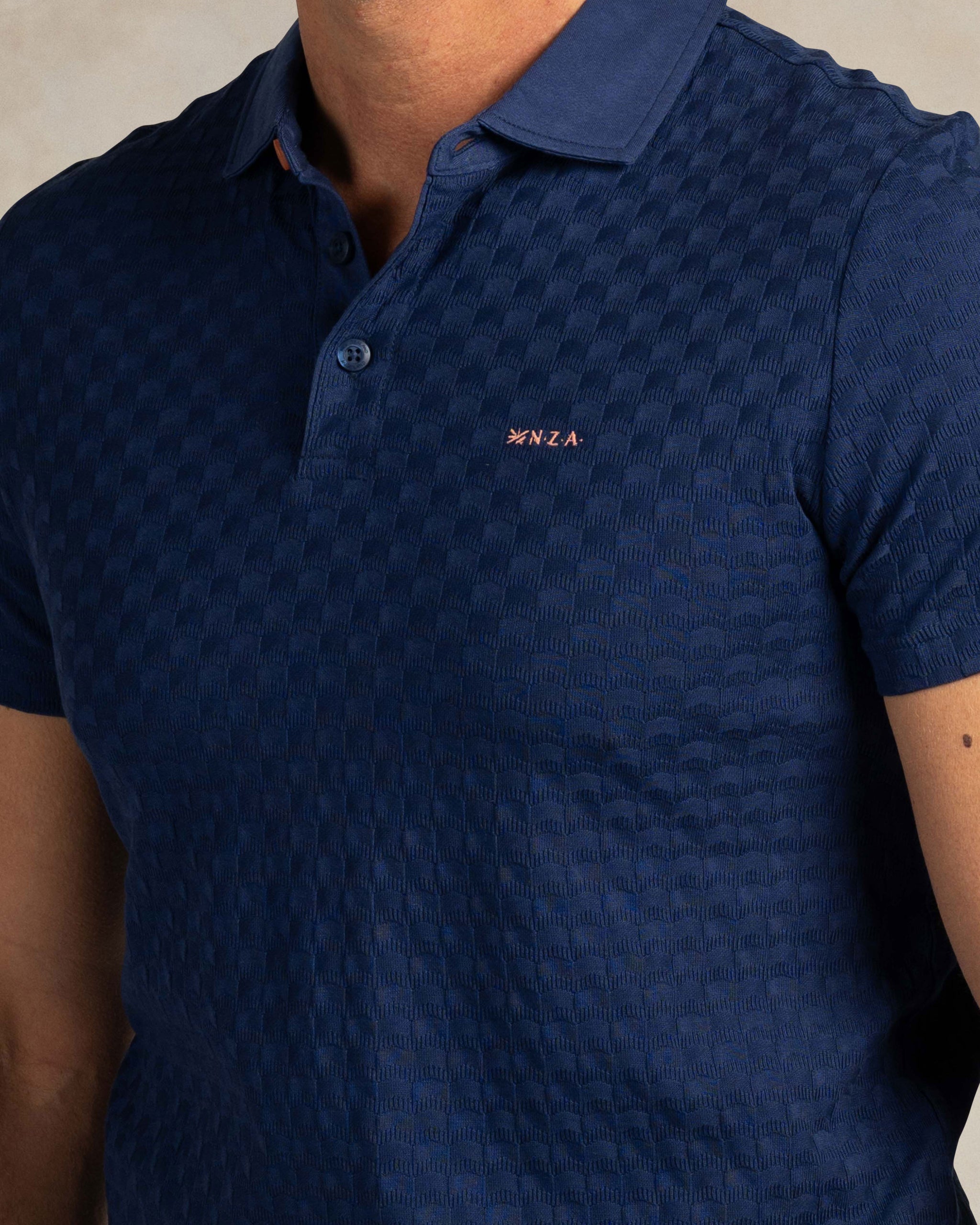 Blauwe 100% katoenen polo Blauwe 100% katoenen polo