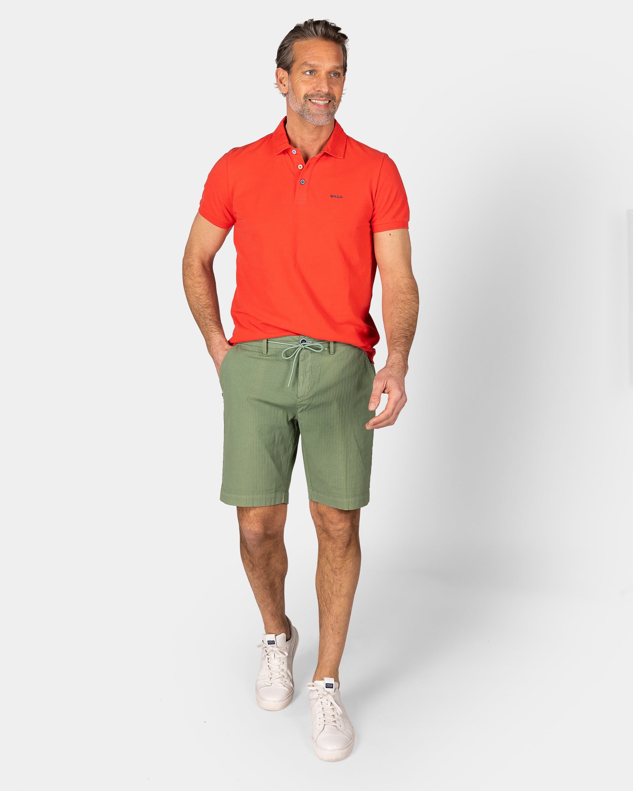 Effen katoenen roodoranje polo Effen katoenen roodoranje polo