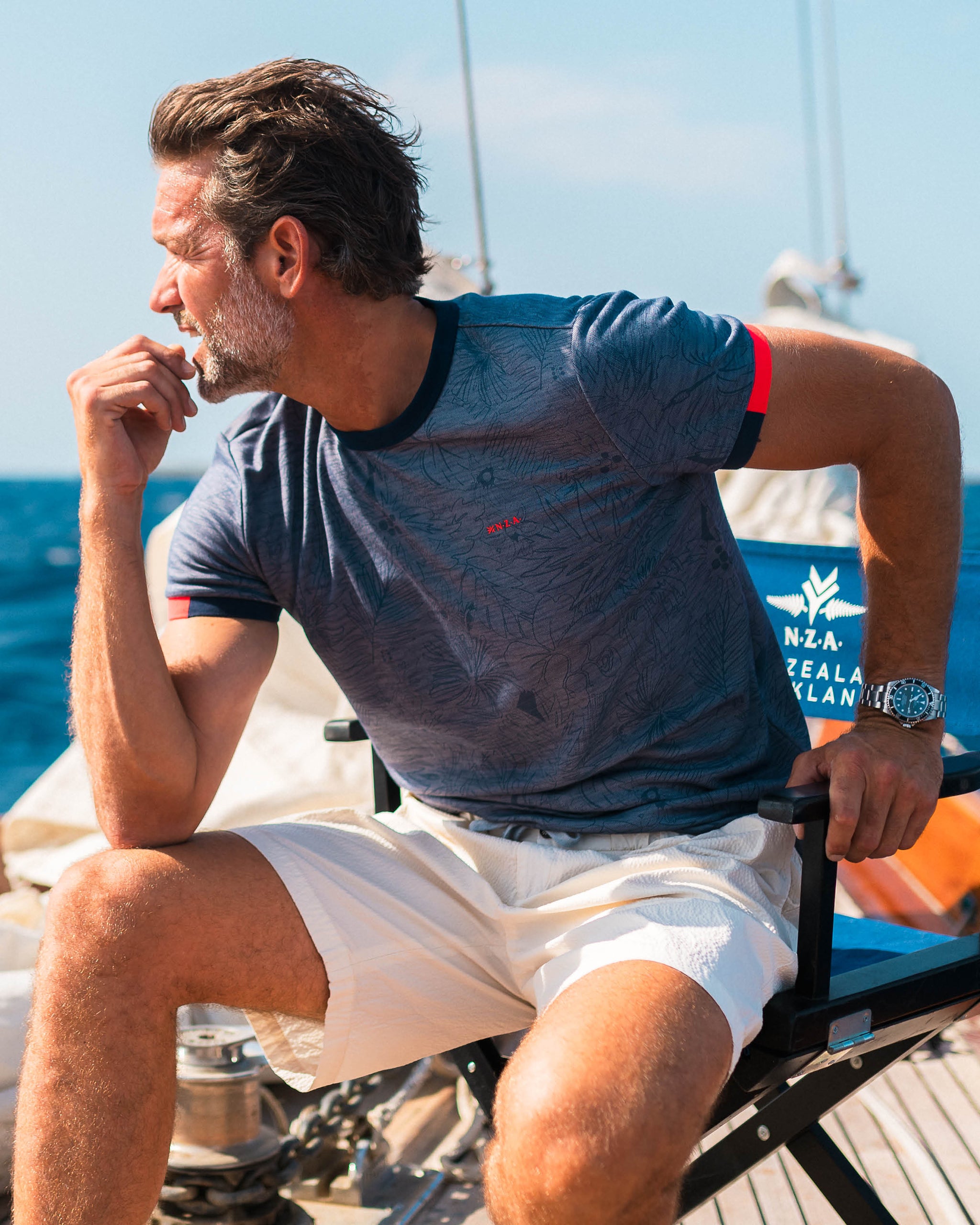 Blue round-neck T-shirt with leaf print Blue round-neck T-shirt with leaf print