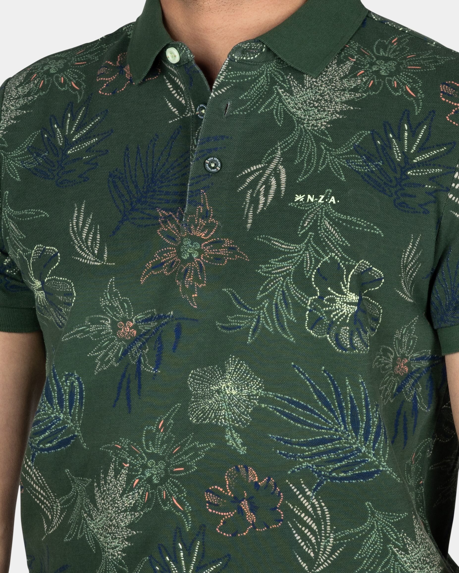 Katoenen groene polo met bladprint Katoenen groene polo met bladprint