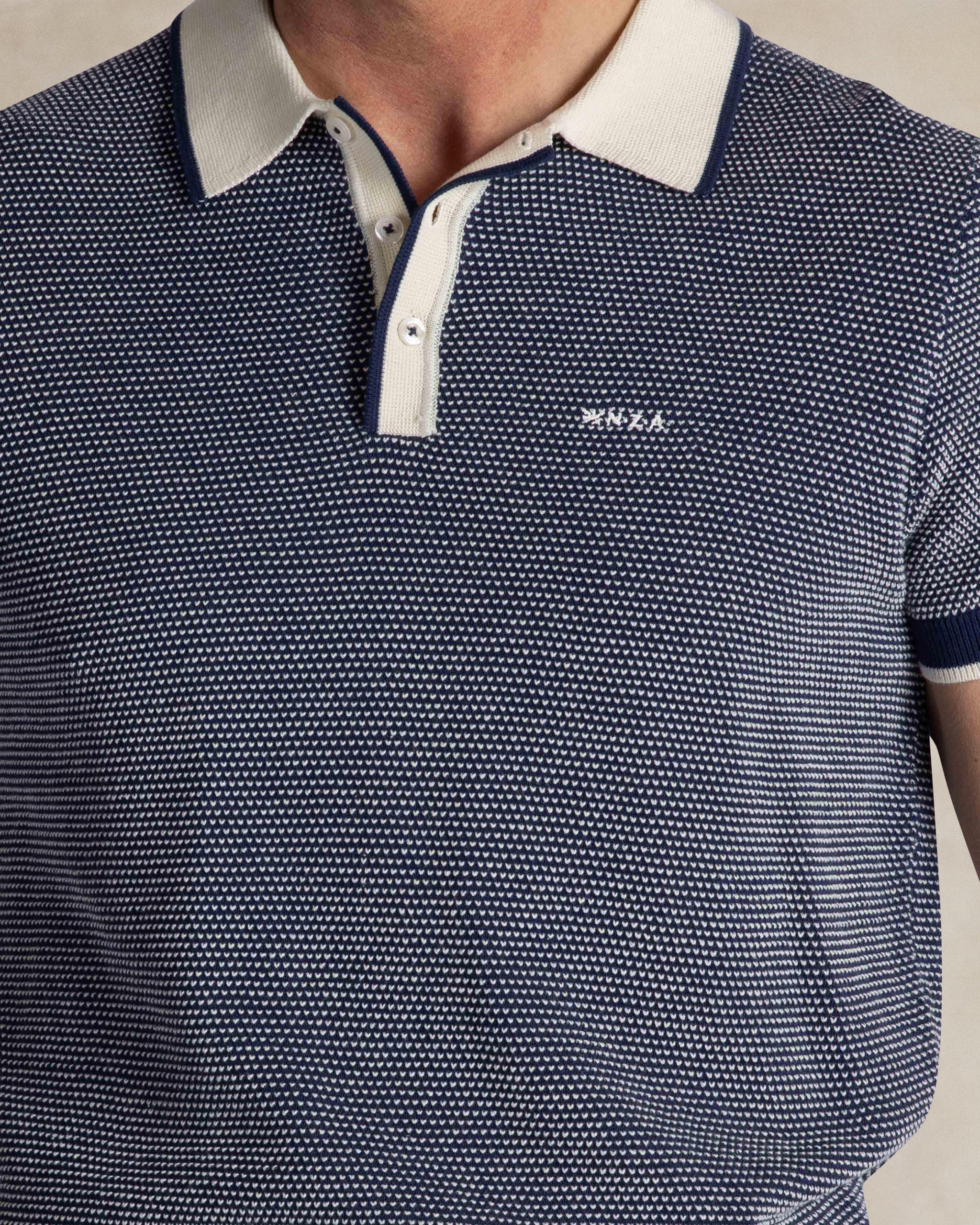 Blaue gestrickte Baumwollpolo Blaue gestrickte Baumwollpolo