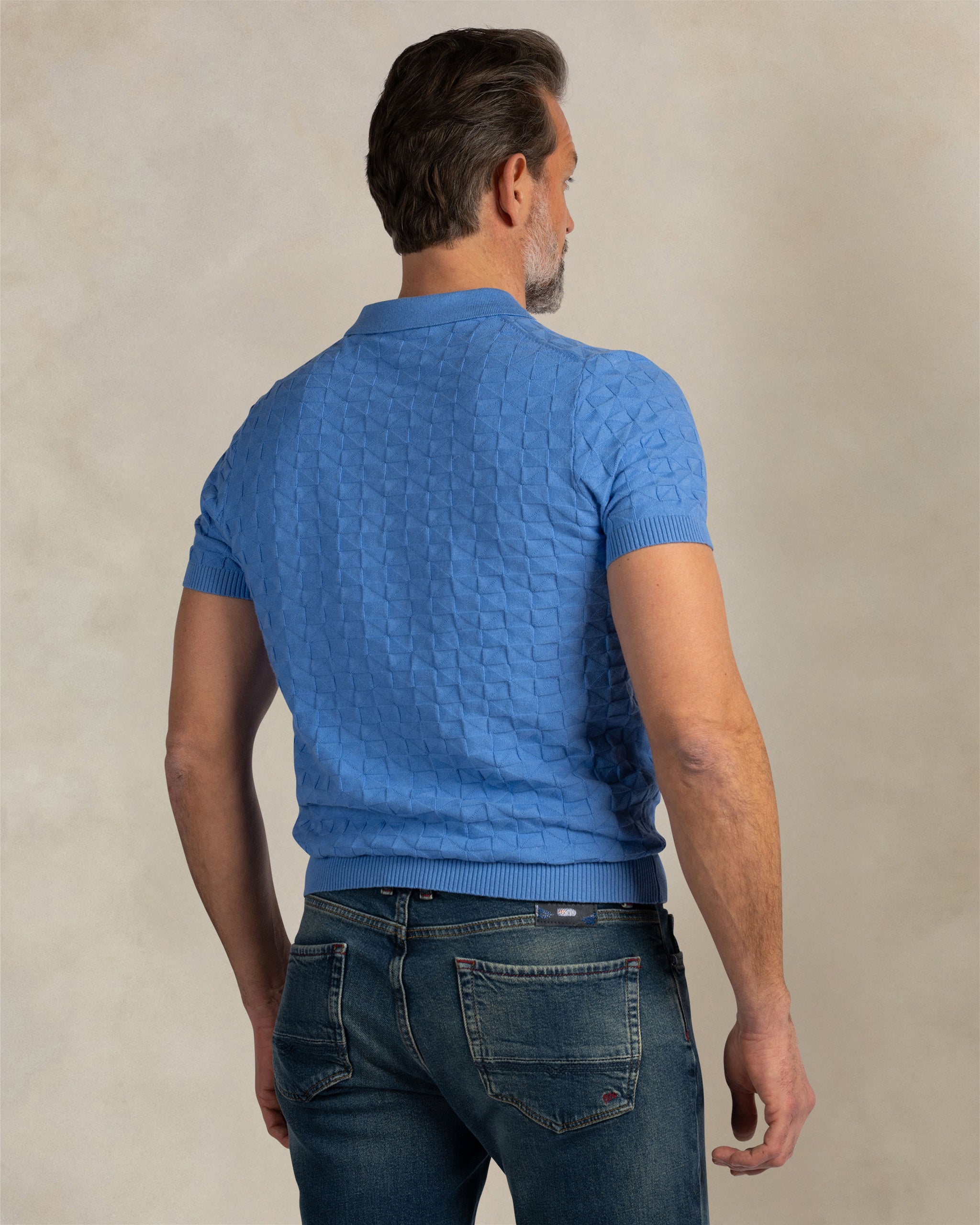 Blauwe structuur polo Blauwe structuur polo